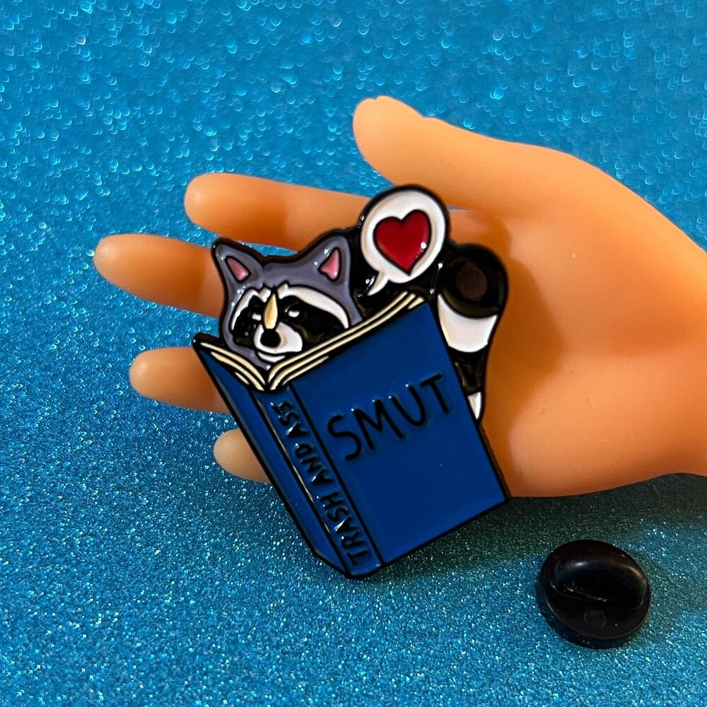 Smut Loving Raccoon Enamel Pin - Unique Gift for Readers and Animal Lovers
